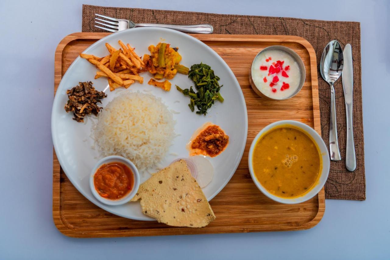 Quick 20 Riverside Hotel Amlekhganj Bagian luar foto